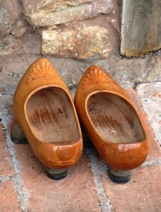Asturian clogs, with two heels in the front and one in the back to keep one's feet out of the muck